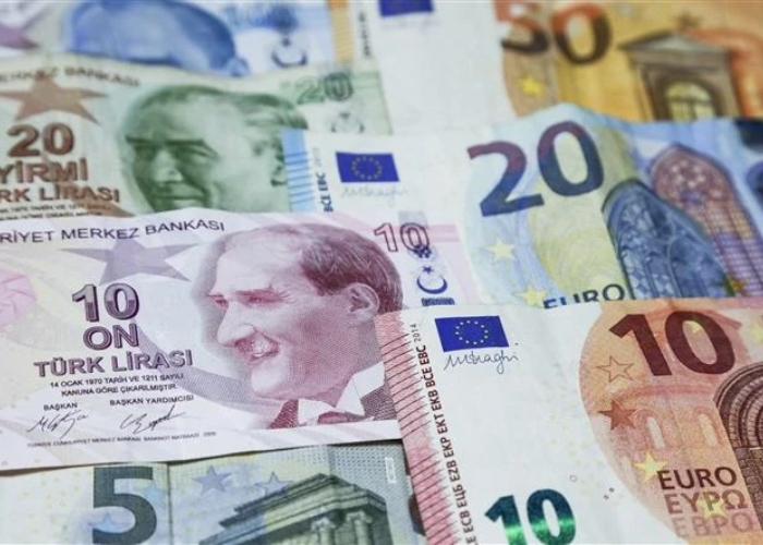 Đơn vị tiền tệ và đổi tiền. Ảnh: Vietnam+